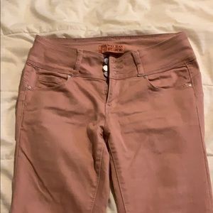 Blush pink skinny jeans